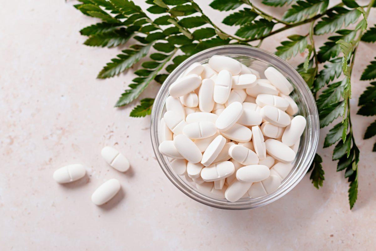 white tablets in a glass bowl